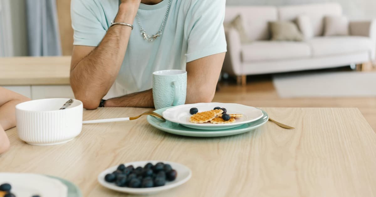 Man over 40 refusing sugary snacks, choosing healthier options for better energy