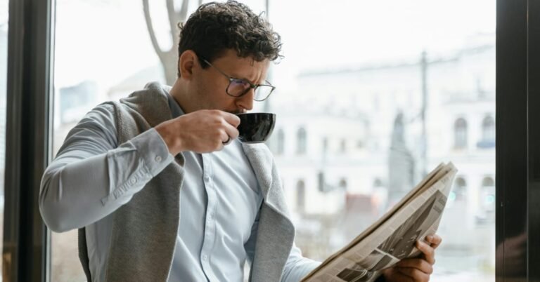 Man over 40 drinking his morning coffee before lunch, having cut afternoon caffeine for better sleep