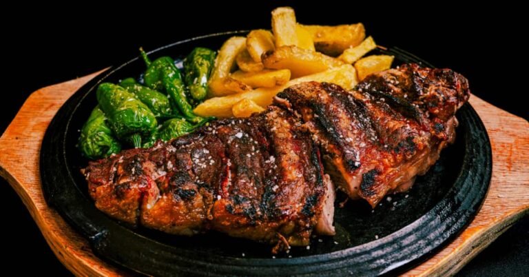 Man over 40 choosing a grilled protein dish at a restaurant while eating out mindfully