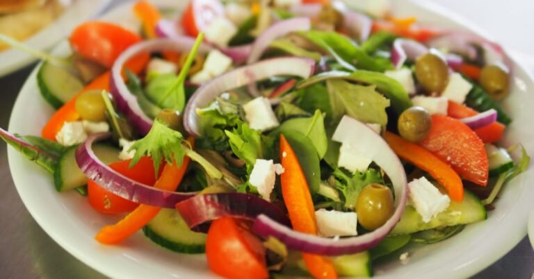Bowl of vegetables and legumes on a kitchen table, high fibre meal for men over 40
